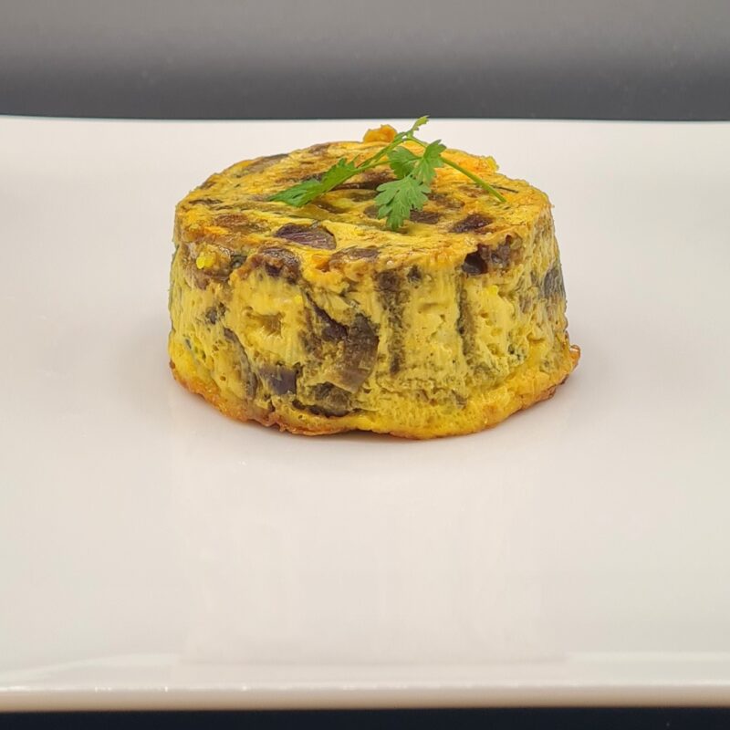 Dariole de courgettes, oignons rouges confits et curcuma